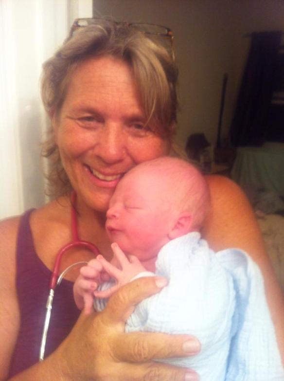 Me & Ethan after I completed his newborn exam.